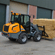 carregadeira de rodas / compacta / com cabine